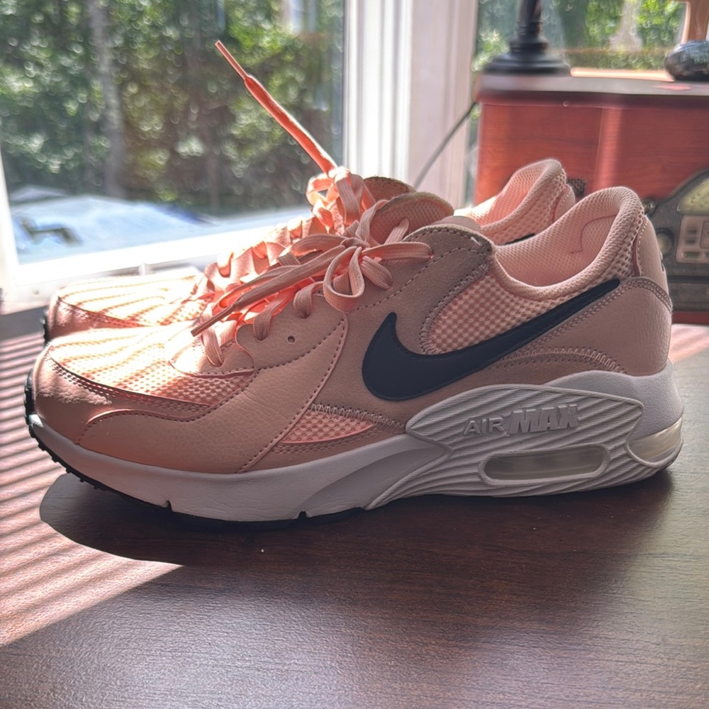 Nike Pink and Black Sneakers with Mesh Design